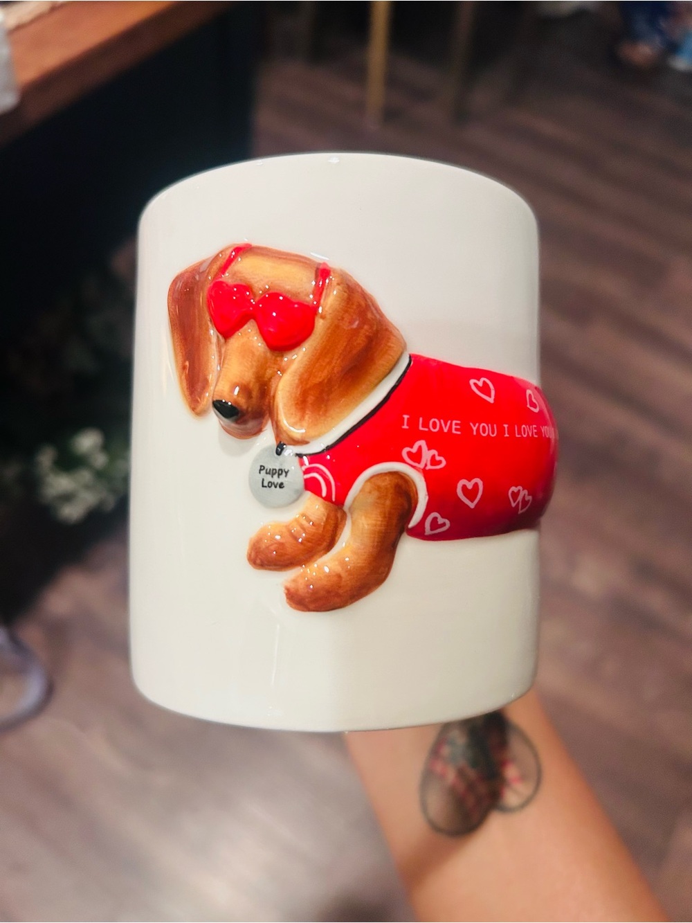 novelty ceramic coffee mug featuring a 3D sculpted dachshund handle